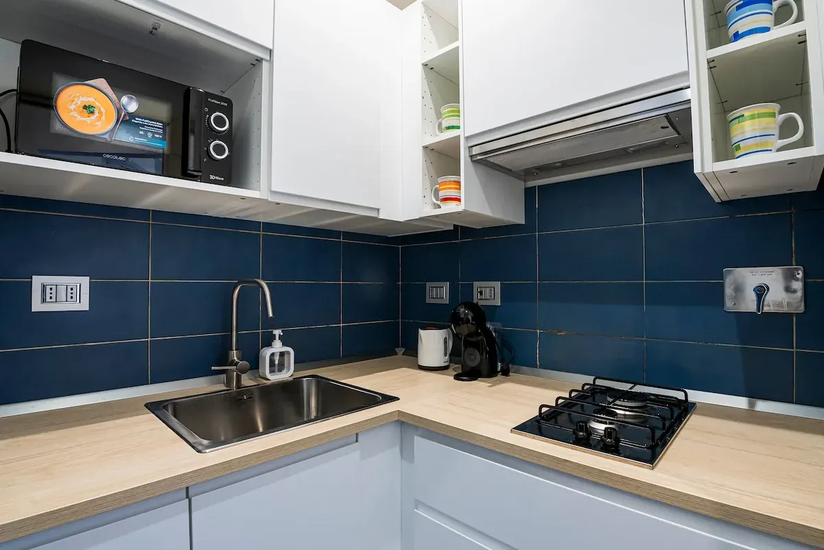 Equipped kitchen · Hob and coffee machine